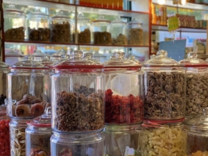 Assorted jars of dried Chinese fruit snacks