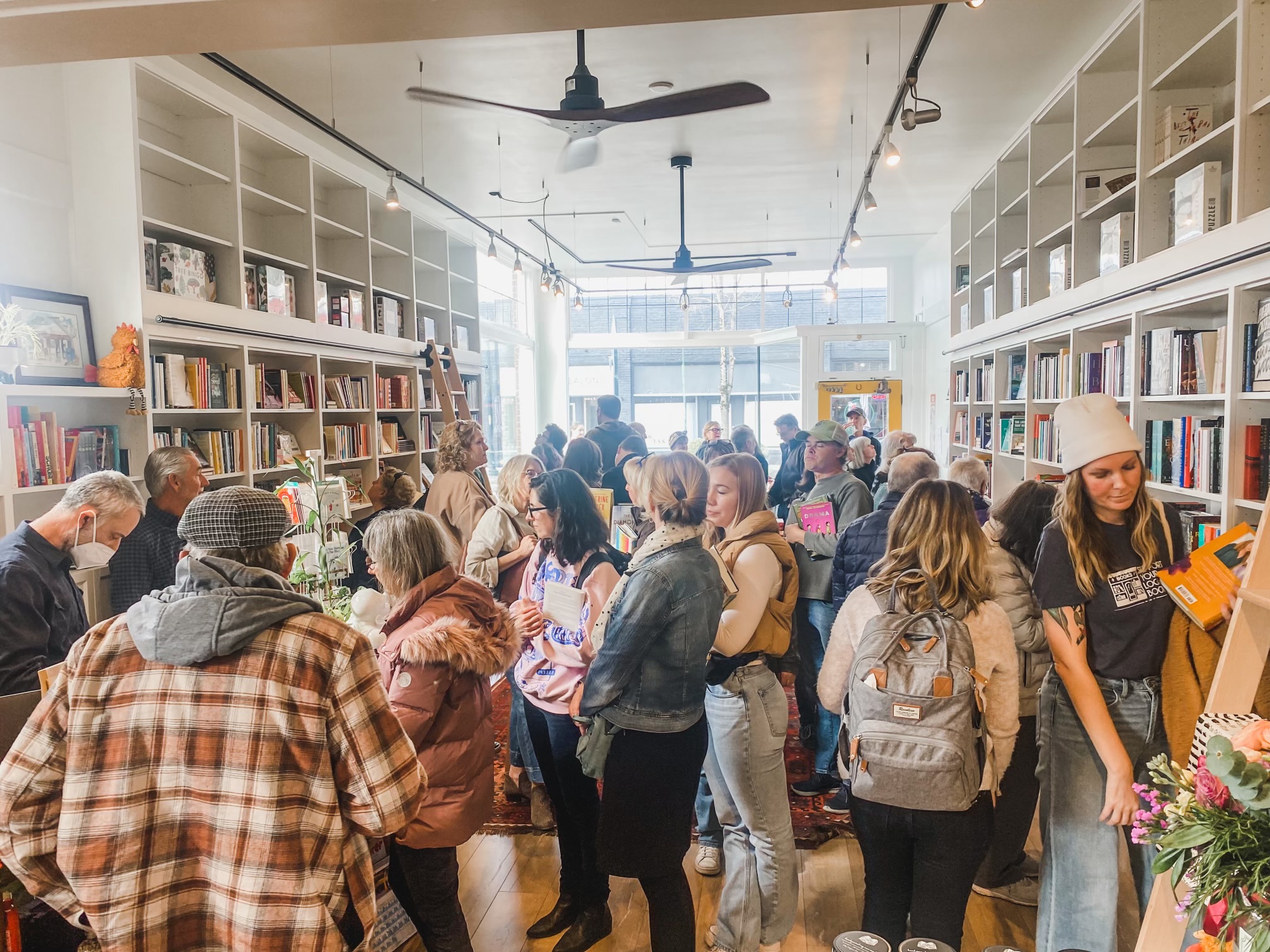 Three Trees Books interior with lots of shoppers