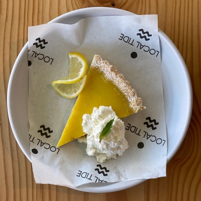 Aerial view of a slice of lemon pie.