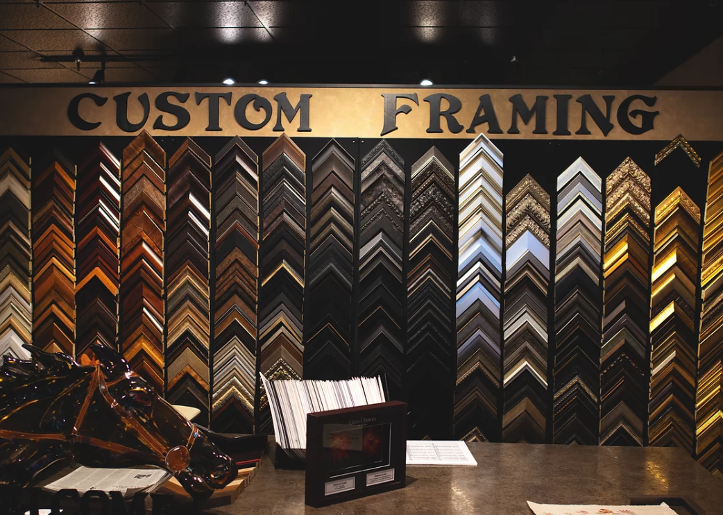 The framing station at American Art Company