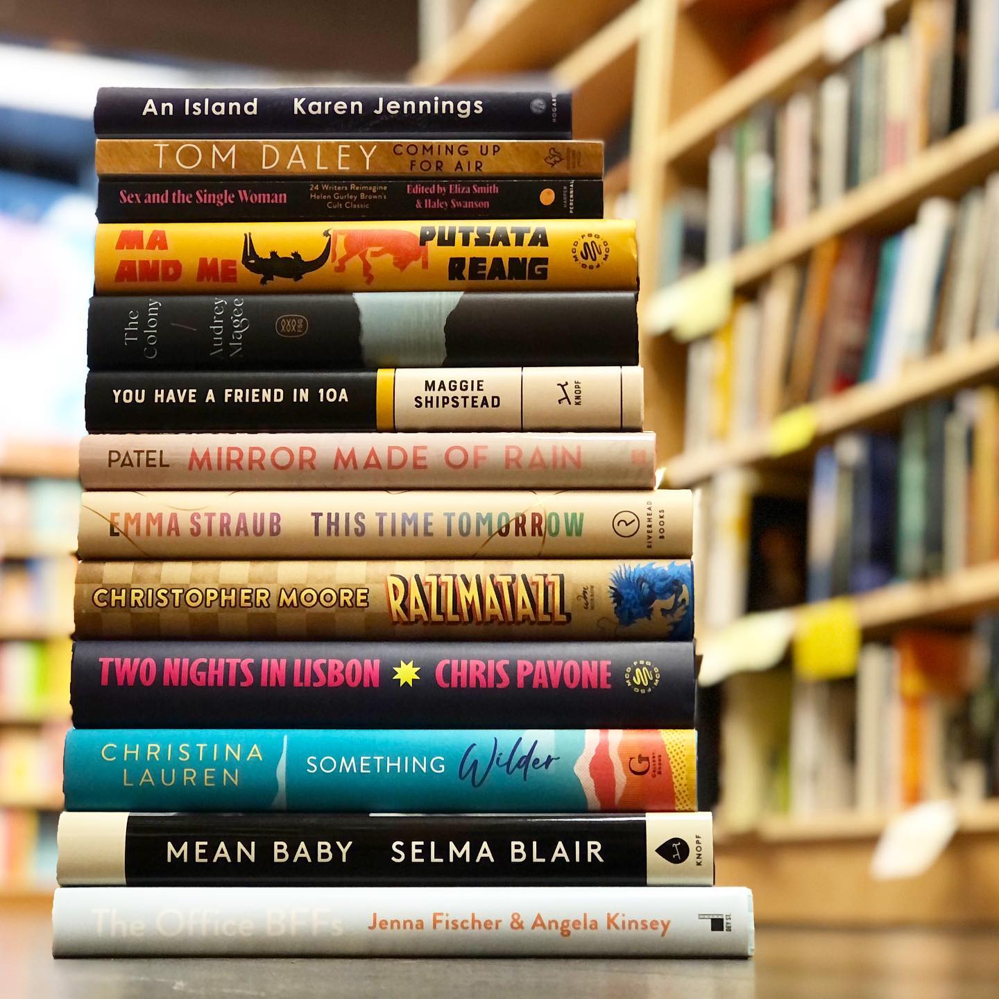 A stack of books at Unabridged Bookstore