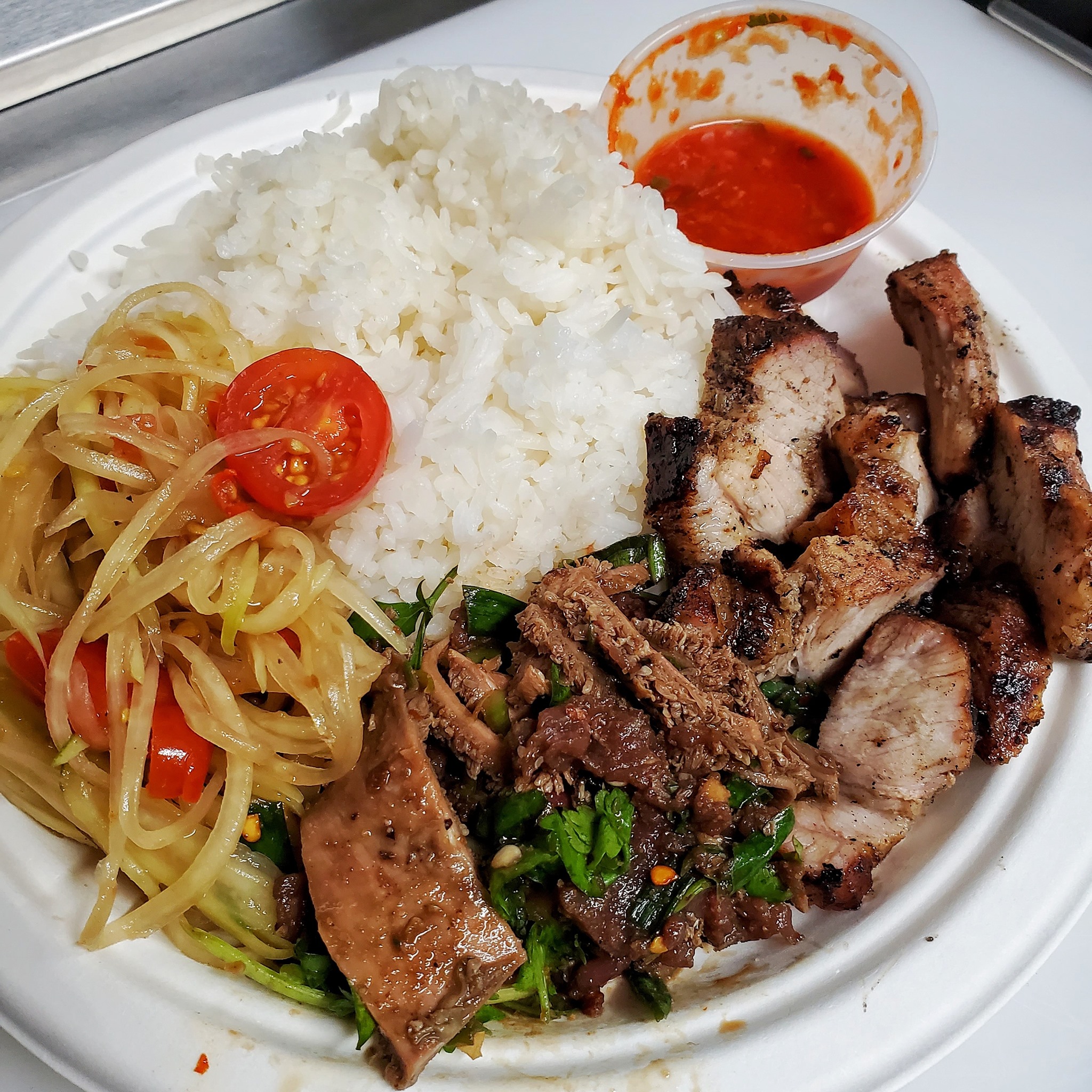 Grilled fatty pork with papaya salad