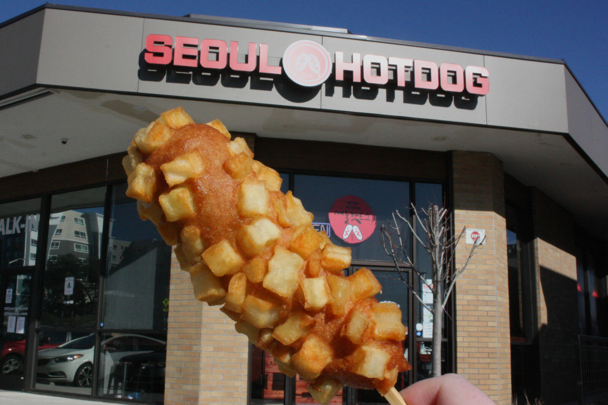 Exterior of restaurant and potato corndog