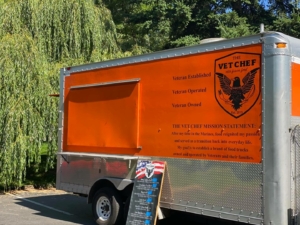 Exterior of food truck and business logo