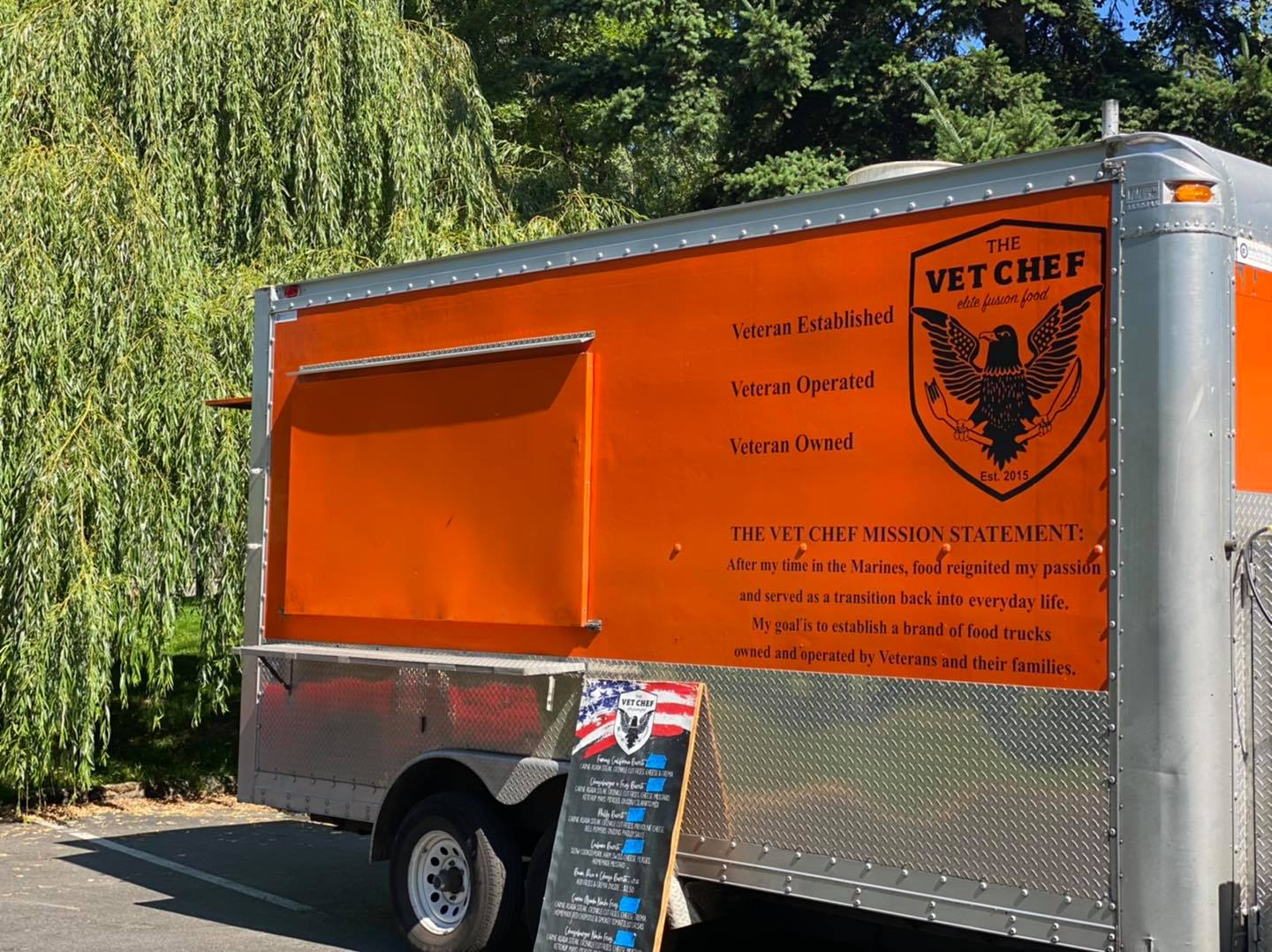 Exterior of food truck and business logo