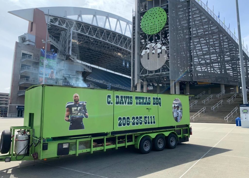 photo of C. Davis Texas BBQ food truck parked out front of Lumen Field in Seattle, WA